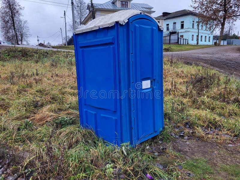 autumn-day-blue-single-closed-plastic-public-toilet-stall-stands-street-425155853-3671904295.jpg